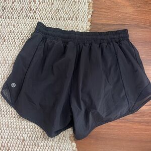 Size 8 Lululemon Hotty Hot shorts worn once 4 inch inseam
